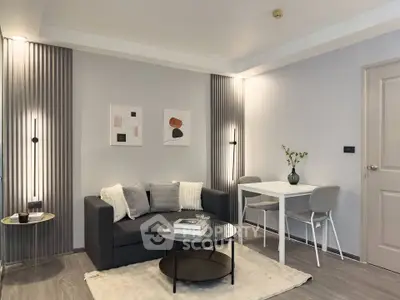 Modern living room with stylish decor and cozy seating area, perfect for relaxation and entertaining.