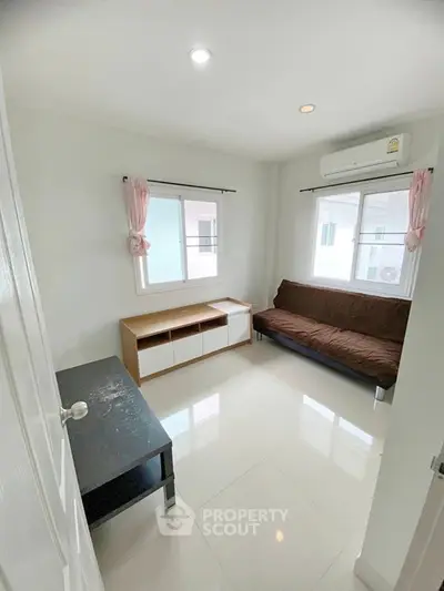 Cozy living room with modern furnishings and natural light