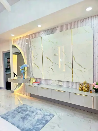 Luxurious modern living room with marble accents and elegant decor