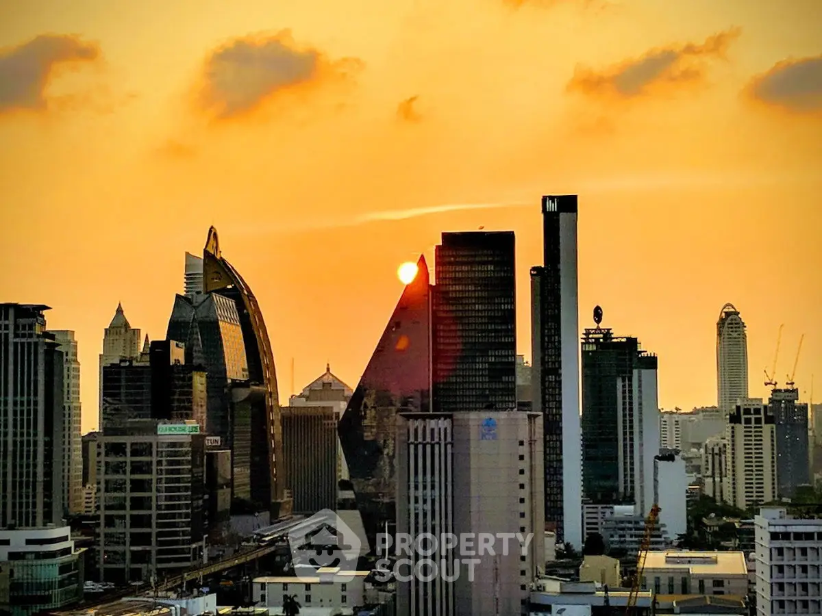 Stunning city skyline at sunset with iconic skyscrapers and vibrant urban atmosphere.