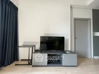 Modern living room with sleek TV stand and minimalist decor