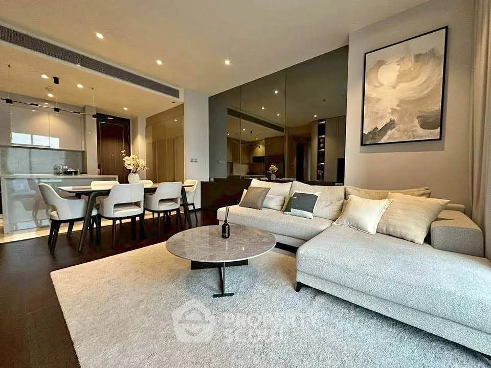 Luxurious modern living room with elegant decor and open kitchen layout