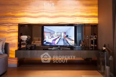 Luxurious living room with elegant TV setup and ambient lighting