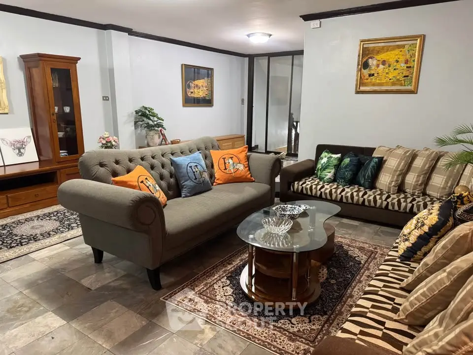 Elegant living room with stylish sofas and modern decor, perfect for relaxation and entertaining guests.