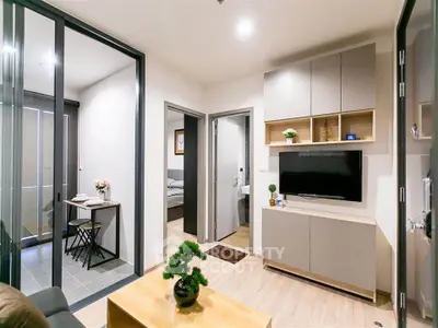 Modern living room with sleek furniture and open layout in stylish apartment