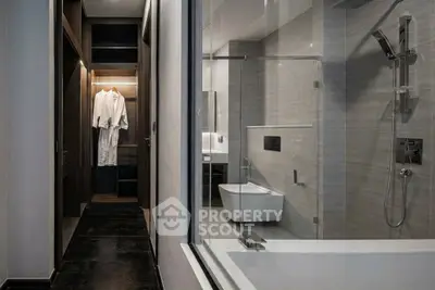 Luxurious modern bathroom with glass shower and elegant fixtures