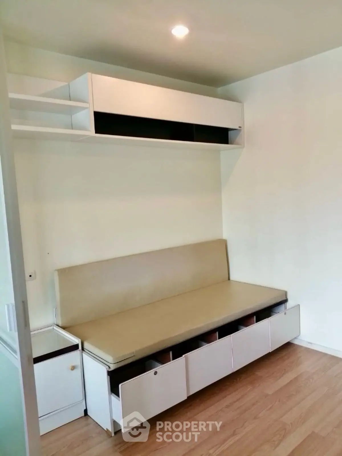 Compact and functional study room with built-in storage and seating