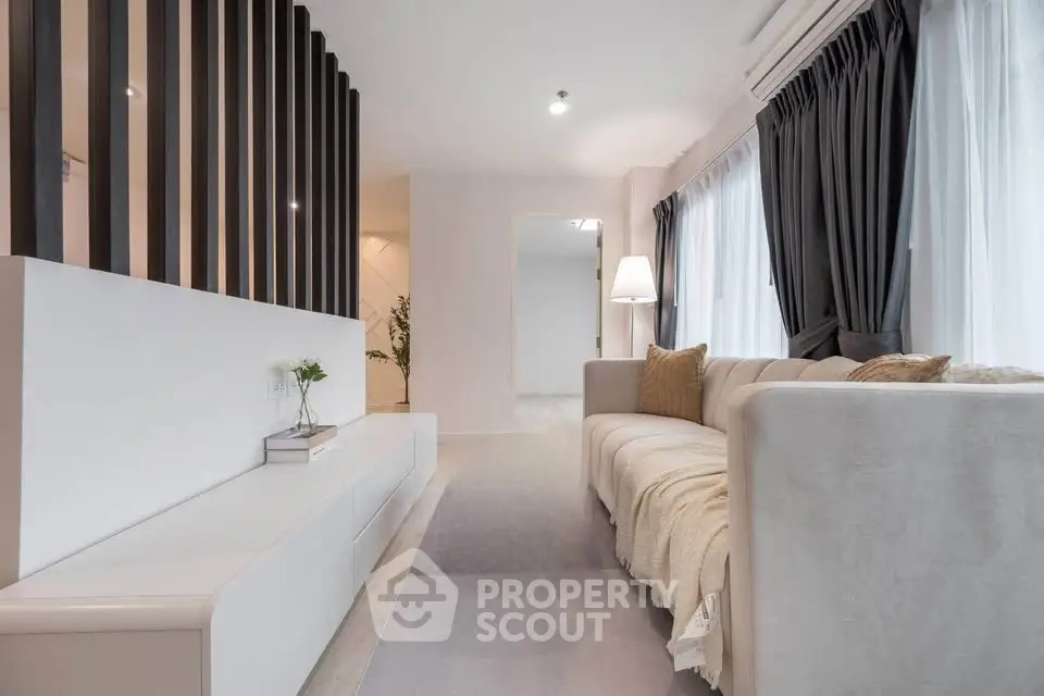 Modern living room with sleek design and natural light