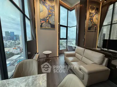 Luxurious high-rise living room with stunning city views and modern decor