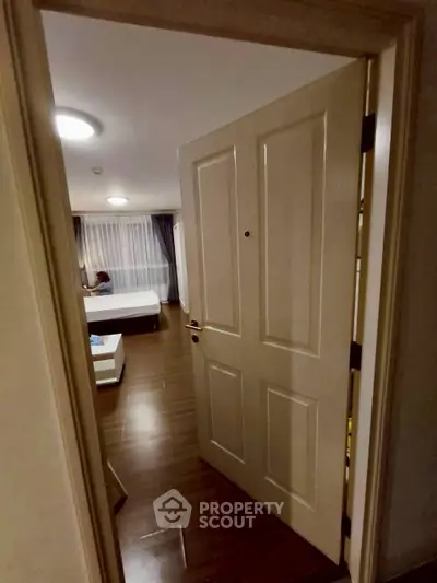 Inviting bedroom with cozy ambiance and modern furnishings, perfect for relaxation and comfort.