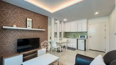 Modern living room with stylish decor and open kitchen layout