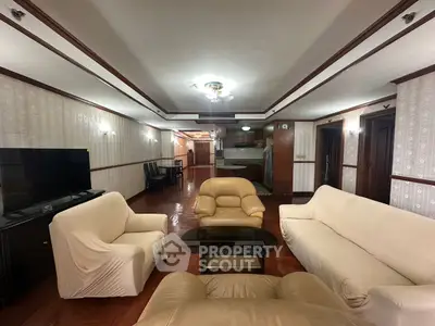 Spacious living room with elegant furniture and open layout, perfect for entertaining guests.