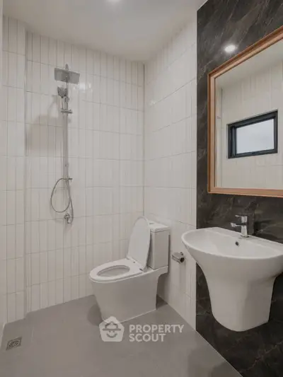 Modern bathroom with sleek fixtures and elegant tile design