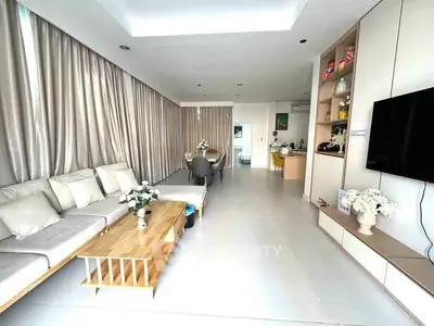 Spacious modern living room with elegant decor and open layout