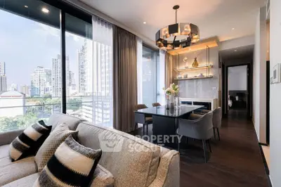 Luxurious modern living room with city view, elegant dining area, and stylish decor in high-rise apartment.