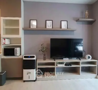 Modern living room with sleek TV stand and minimalist decor