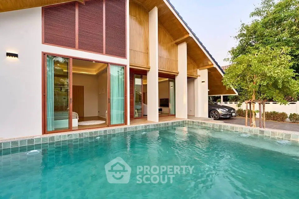 Stunning modern home with private pool and sleek architectural design.