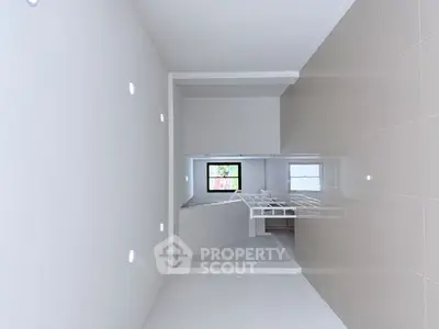 Spacious modern living room with sleek tile flooring and large window for natural light.