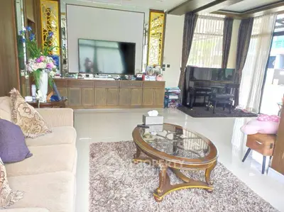 Luxurious living room with elegant decor and grand piano, perfect for entertaining.