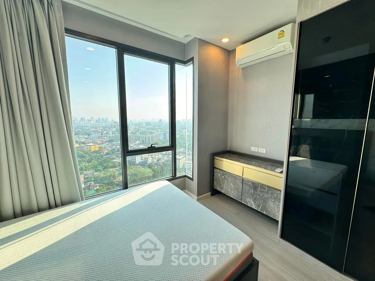 Modern bedroom with stunning city view and sleek interior design