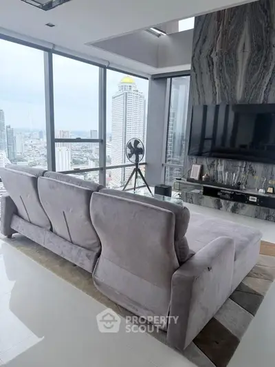 Luxurious living room with panoramic city view and modern decor