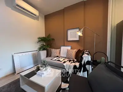 Modern living room with stylish decor and cozy seating area