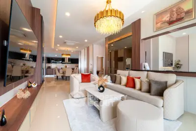 Luxurious modern living room with elegant chandelier and stylish decor