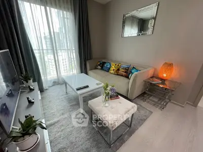 Stylish modern living room with elegant decor and large window view