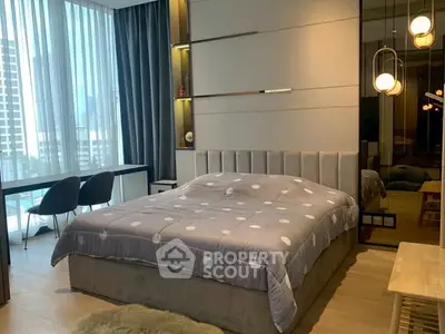 Modern bedroom with city view, stylish decor, and cozy ambiance.