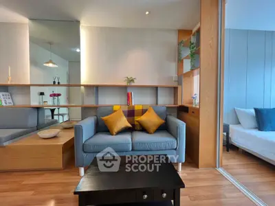 Modern living room with stylish decor and cozy seating area