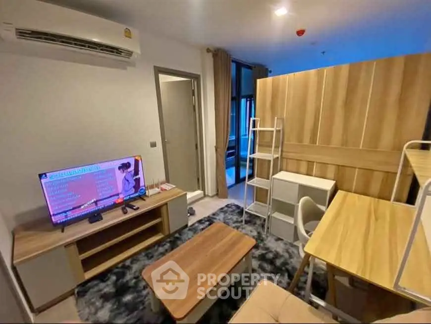 Modern living room with stylish furniture and entertainment setup