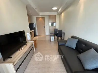 Modern living room with sleek furniture and open layout, perfect for contemporary living.