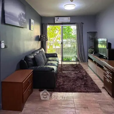 Cozy living room with modern decor and garden view