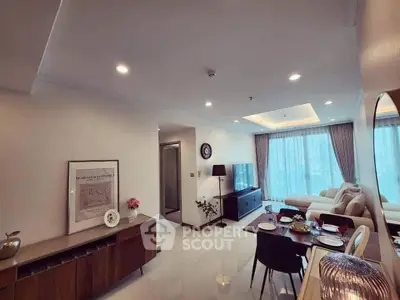 Spacious modern living room with elegant decor and dining area