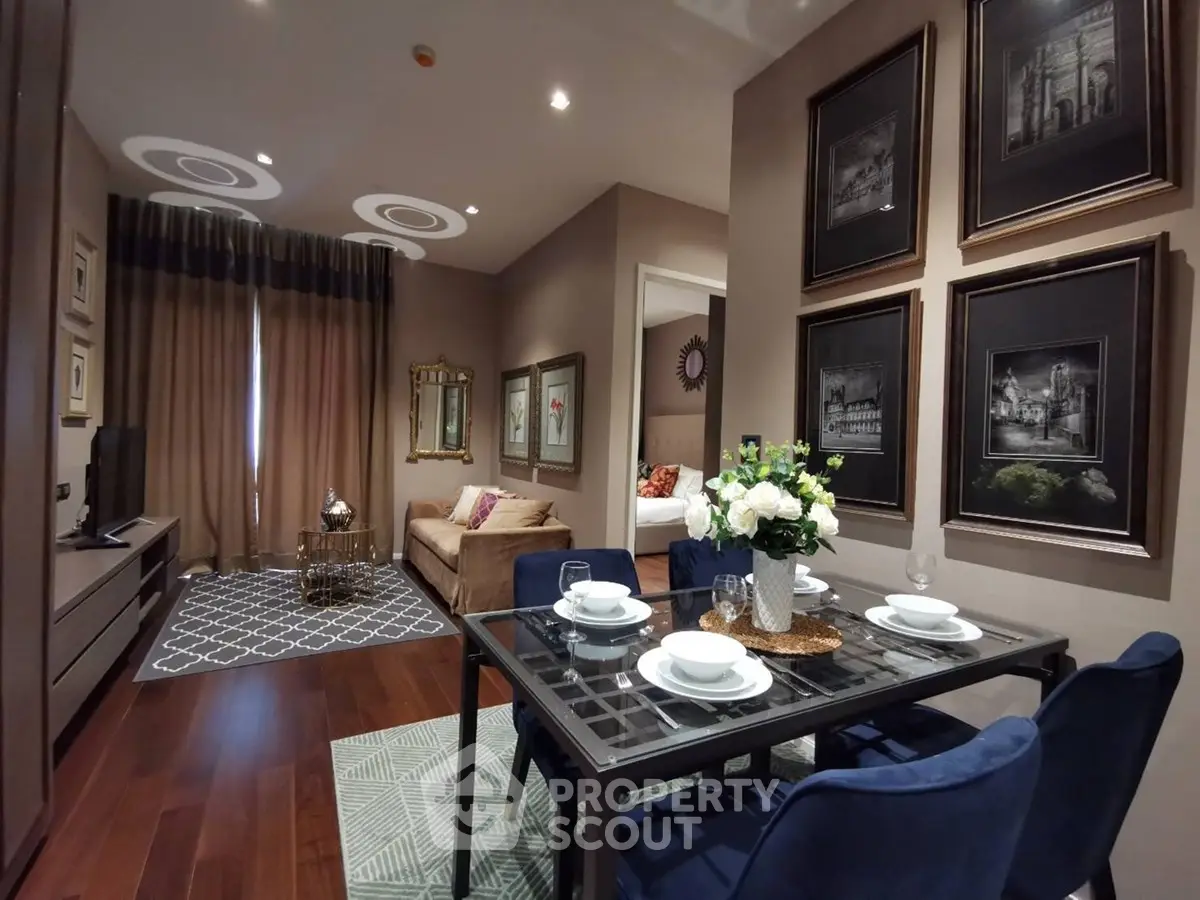 Elegant living room with dining area, stylish decor, and cozy ambiance in modern apartment.