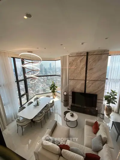 Luxurious high-rise living room with stunning city views and modern decor