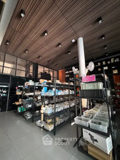 Spacious storage area with organized shelves and modern ceiling design