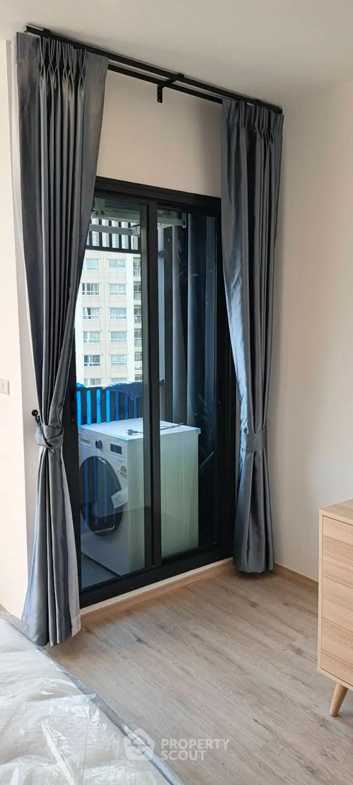 Modern living room with large windows and stylish decor