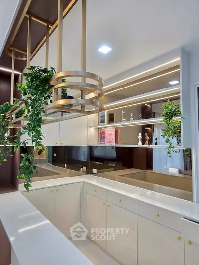 Luxurious modern kitchen with elegant cabinetry and stylish lighting