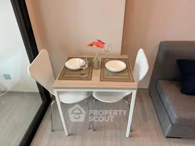 Cozy dining nook with modern table setting in stylish apartment