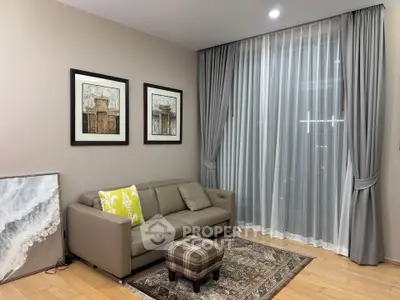 Elegant living room with modern decor and large window