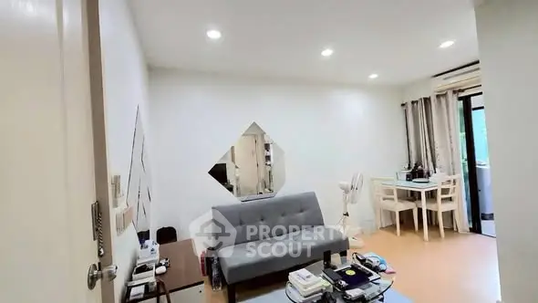 Cozy living room with modern decor and natural light