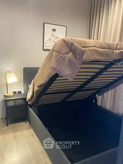 Modern bedroom with storage bed and elegant decor