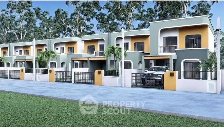 Modern townhouse complex with vibrant colors and lush greenery, perfect for family living.
