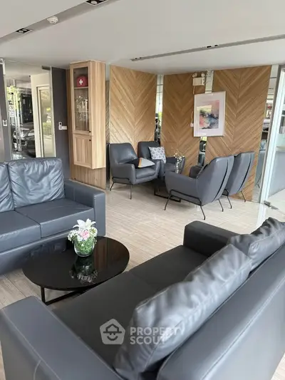 Modern living room with sleek leather sofas and stylish decor