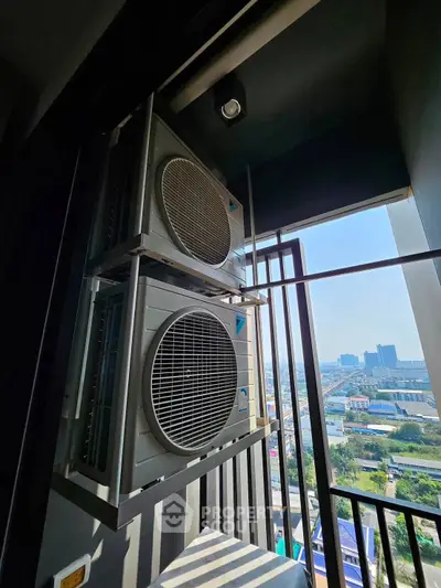 Modern balcony with air conditioning units and city view, perfect for urban living.