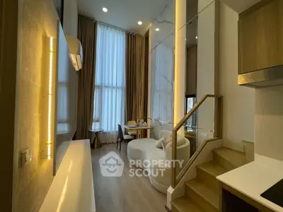 Modern living room with high ceilings and elegant decor in a stylish apartment