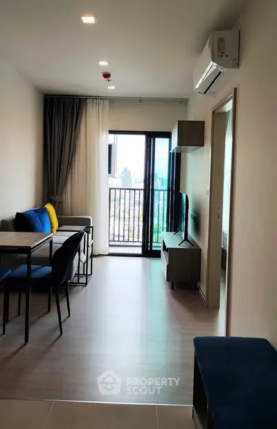 Modern living room with balcony view in a stylish apartment