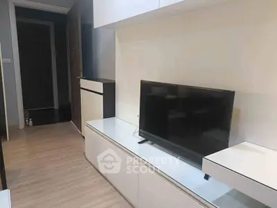 Modern living room with sleek TV unit and minimalist design