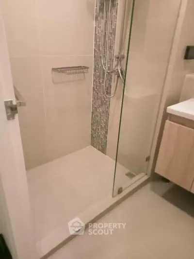 Modern bathroom with sleek shower design and glass enclosure